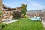 Take in the sunshine in the fenced backyard, pet friendly